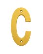 Letra "C" decorativa 83 mm de aluminio dorado